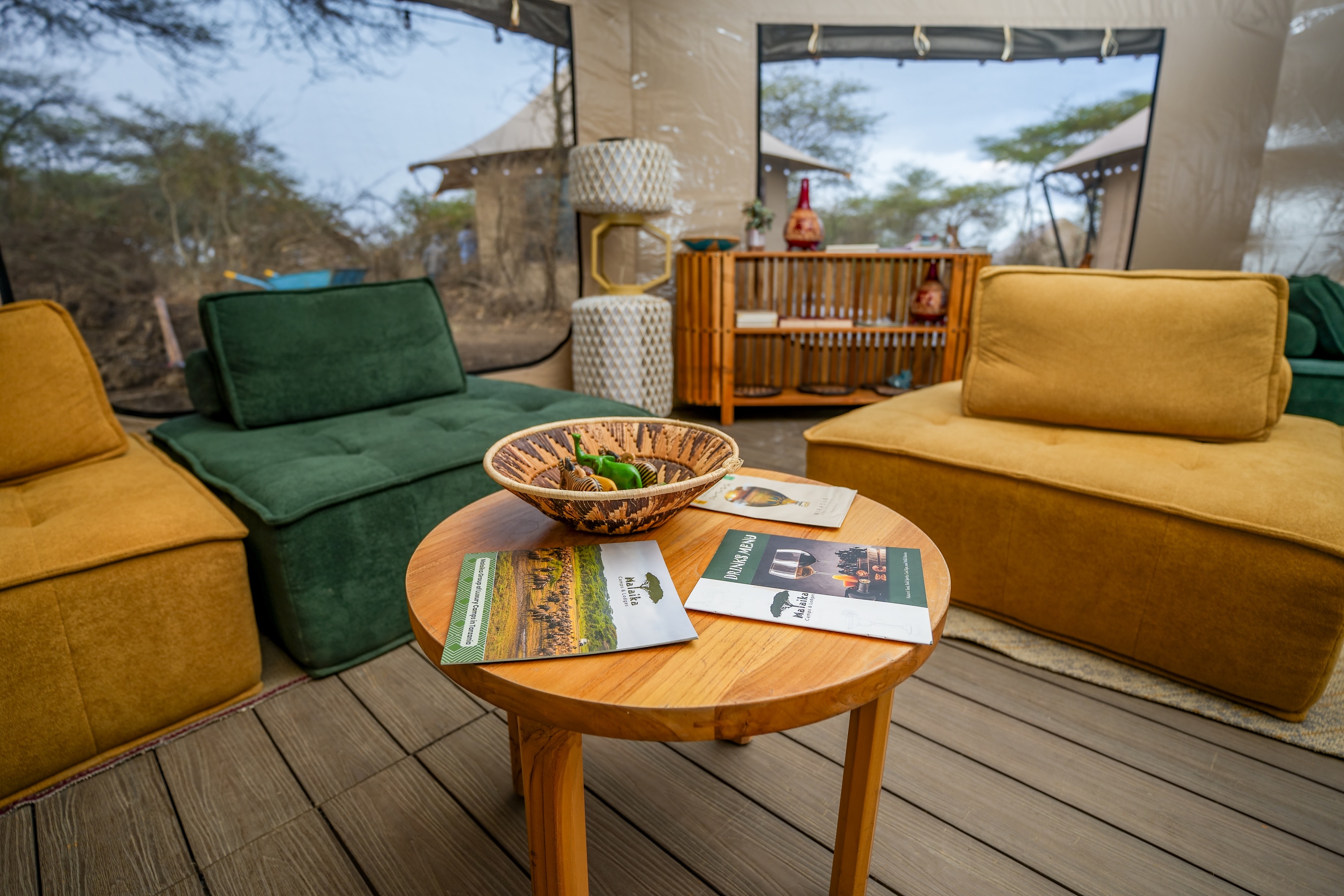 Camp bar area with wooden furnishing and pendant lighting