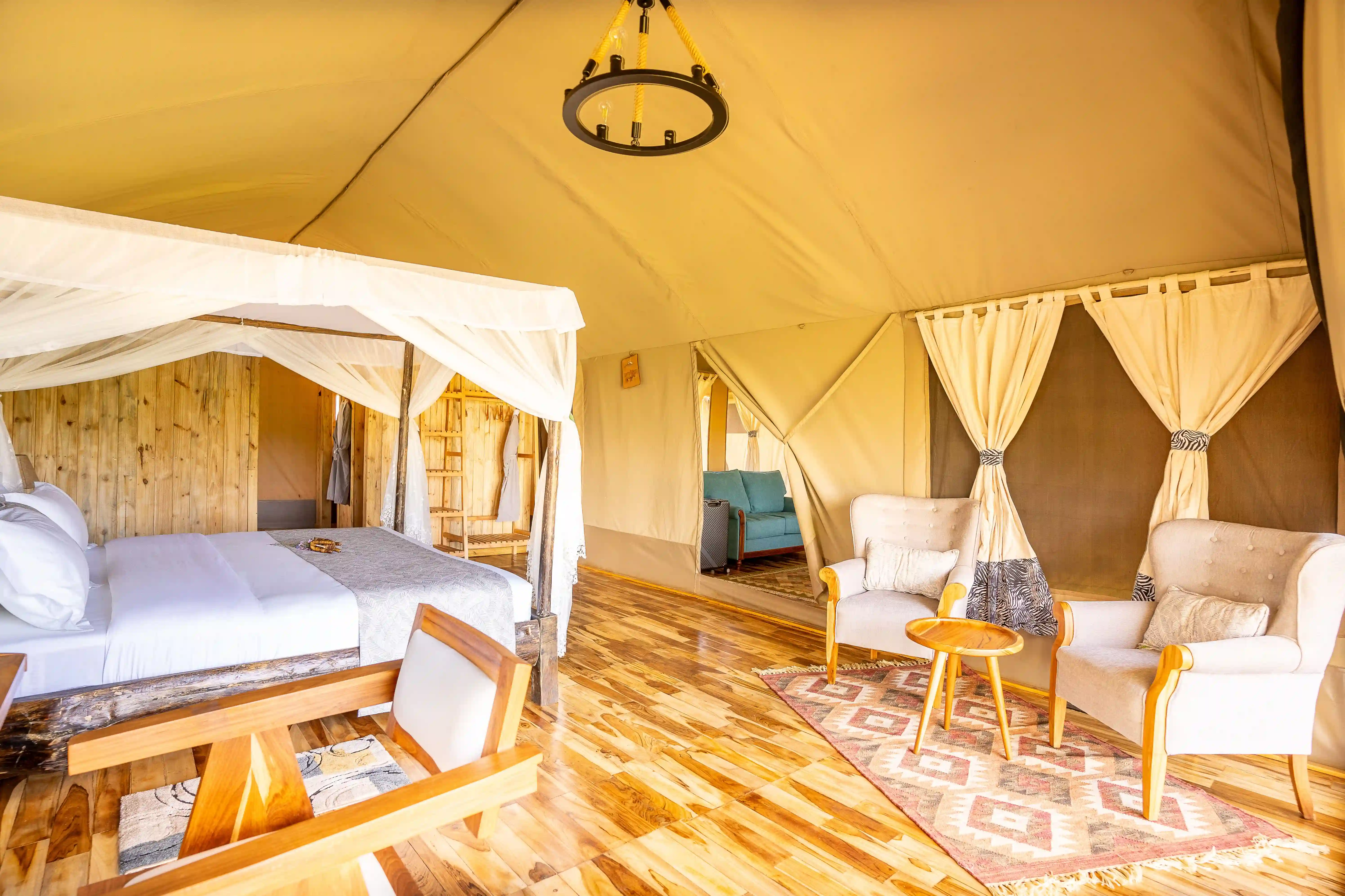 Spacious tent with canopy bed and scenic windows